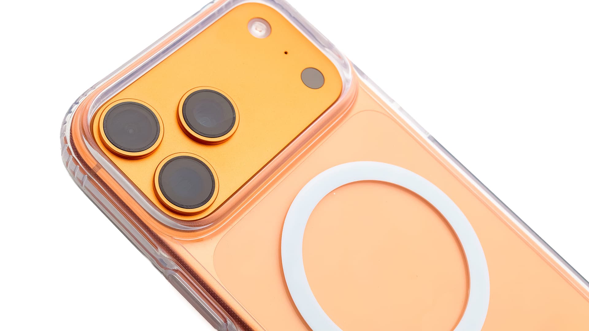 Clear MagSafe case on an orange iPhone