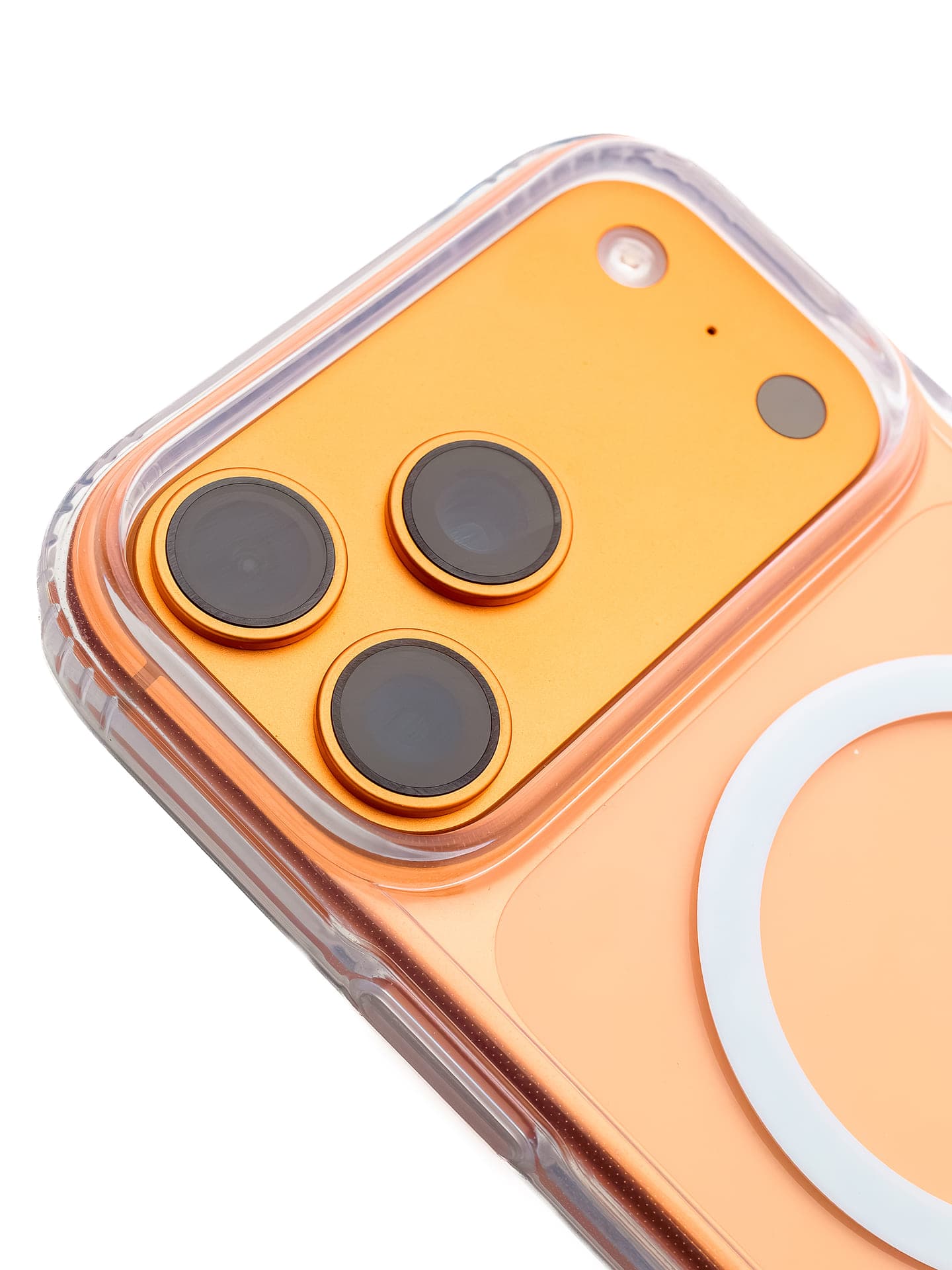 Clear MagSafe case on an orange iPhone